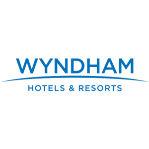 Wyndham Hotels & Resorts logo in blue with a wave accent.